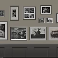 Wall Decor With Multiple Size Frames Displaying Black White Photos And Scenery
