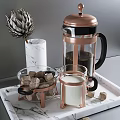 Elegant Kitchen Tools Featuring French Press White Mug Glass Bowl Sugar Cubes And Marble Tray