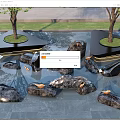 Garden Ornaments With Water Feature Natural Stones And Trees On Circular Platforms
