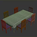 Rectangular Dining Table With Black White Checkered Cloth And Orange Wooden Chairs