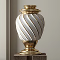 Elegant Ceramic Vessel With White Spiral Patterns And Gold Base Top Accents 3d model