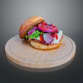 Freshly Prepared Hamburger On Wooden Cutting Board With Sesame Bun Lettuce Red Onion And Sauce