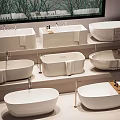 Modern White Bathtubs Display In Showroom With Different Styles And Designs