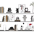 Decorative Ornament Set on White Shelves with Books Small Sculptures Framed Art and Vases