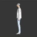 Man in Light Gray Long Sleeve Top and Light Blue Jeans Standing Against Dark Background