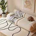 Beige Two Seater Sofa With Knitted Blanket Decorative Pillow On Curved Rug And Abstract Art
