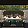 Elegant Interior Space With Circular Frame Landscape Wall Stone Finish Green Plants And Black Sofas