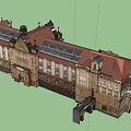Historic Building Exterior With Red Roof Arched Doors Windows And Tower