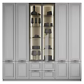 White Modern Storage Cabinet With Glass Door Gold Handles Wine Glasses And Dishes