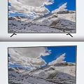Smart TV Displaying Vivid Snowy Mountains and Blue Sky with White Clouds