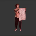 Woman Holding Pink Towel Wearing Pink Top Black Pants And White Shoes Against Gray Background