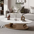 Modern Luxury Living Room Coffee Table With Round White Tabletop Gold Support And Decorative Plants