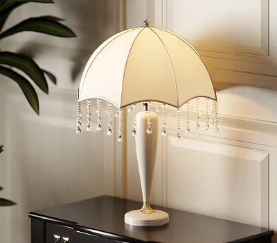 White Decorative Table Lamp With Umbrella Shaped Lampshade Beaded Fringes And Cylindrical Base With Gold Trim 3d model