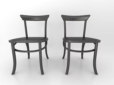 Two Black Modern Dining Chairs With Curved Legs And Sleek Design 3d model