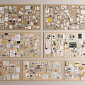 Creative Collage of Papers Photos and Notes Arranged on Multiple Corkboards