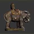 Brown Elephant Sculpture With Red Saddle And Golden Decorative Elements On Base 3d model