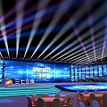 Modern Event Venue With Stage Lighting And Round Tables
