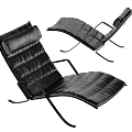 Modern Black Leather Lounge Chair With Quilted Design And Metal Frame
