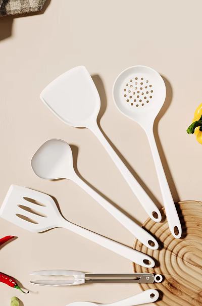 White Kitchen Utensils Including Spatula And Ladle On Light Background 3d model