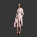 Woman in Pink Dress and Pink Shoes Standing Against Grey Background