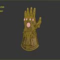 Sculpted Golden Infinity Gauntlet With Intricate Design And Colored Gemstones