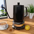 Black Electric Kettle Kitchen Appliance With Coffee Cup Lemon Green Plant On Wooden Countertop
