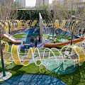 Outdoor Playground Equipment With Colorful Climbing Nets Slides Green Lawn And Trees For Children