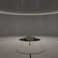 Concrete Circular Garden Ornament With Central Stone Water Flow And Overhead Lighting
