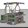 A2 Milk Product Display Kiosk With Purple Striped Awning And Green Packages