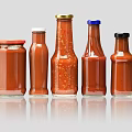 Colorful Glass Condiment Bottles With Red Sauce And Different Caps On Gray Background