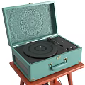 Vintage Audio Speaker System with Teal Case on Wooden Stand and Vinyl Records