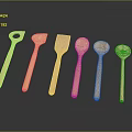 Six Wooden Spoons With Various Shapes Arranged On Dark Background For Kitchen Use
