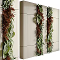 Living Plant Wall Design With Green Leaves And Brown Foliage On Light Colored Indoor Wall