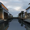 Modern Commercial Street With Canal Modern Buildings Glass Facades Trees And Water Reflections