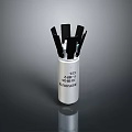 Tactical Weapon With Silver Cylindrical Body And Black Protruding Blade Components