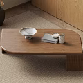 Minimalist Wooden Coffee Table with White Plate Books and Small Cup on Rug
