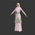 Woman Wearing Traditional Pink Dress With Green Embroidery And Hijab Standing