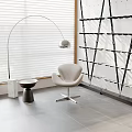 Modern Interior Design With White Blinds Curved Floor Lamp Beige Armchair Side Table Black Geometric Shelves