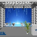 Exhibition Booth Backdrop For Jiangxi Wenhe Electronics With Blue Tech Theme White Chairs And Plant