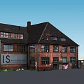Old Red Brick Industrial Building With Black Roof And Multiple Windows