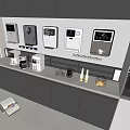 Modern Kitchen With Various Household Appliances On Countertop And Cabinets
