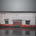 Old Brick Building With White Walls Red Base Boarded Door And Reflection