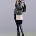 A Woman Wearing Light Pink Long Coat With Checkered Scarf And Black Tight Pants