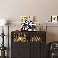Elegant Wine Cabinet With Various Wine Bottles Wine Glasses Drawers And Decorative Items