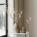 Two Textured Vases With White Flowers And Twigs In Minimalist Interior By Snowy Window