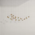 Artistic Multiple Golden Bird Shaped Chandelier Hanging In White Background Decor