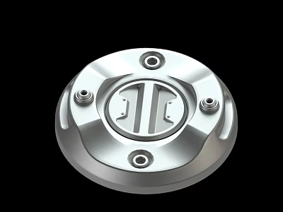Shiny Silver Circular Metal Cover With Central Logo And Screw Holes 3d model
