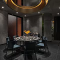 Modern Private Dining Room With Round Table Black Chairs Golden Pendant Light And Decorative Flowers