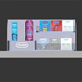 Blue Storage Organizer With Surex Products Colored Boxes And Bottles On Tabletop