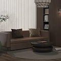 Brown Double Sofa With Decorative Pillows On Light Rug And Round Coffee Table
